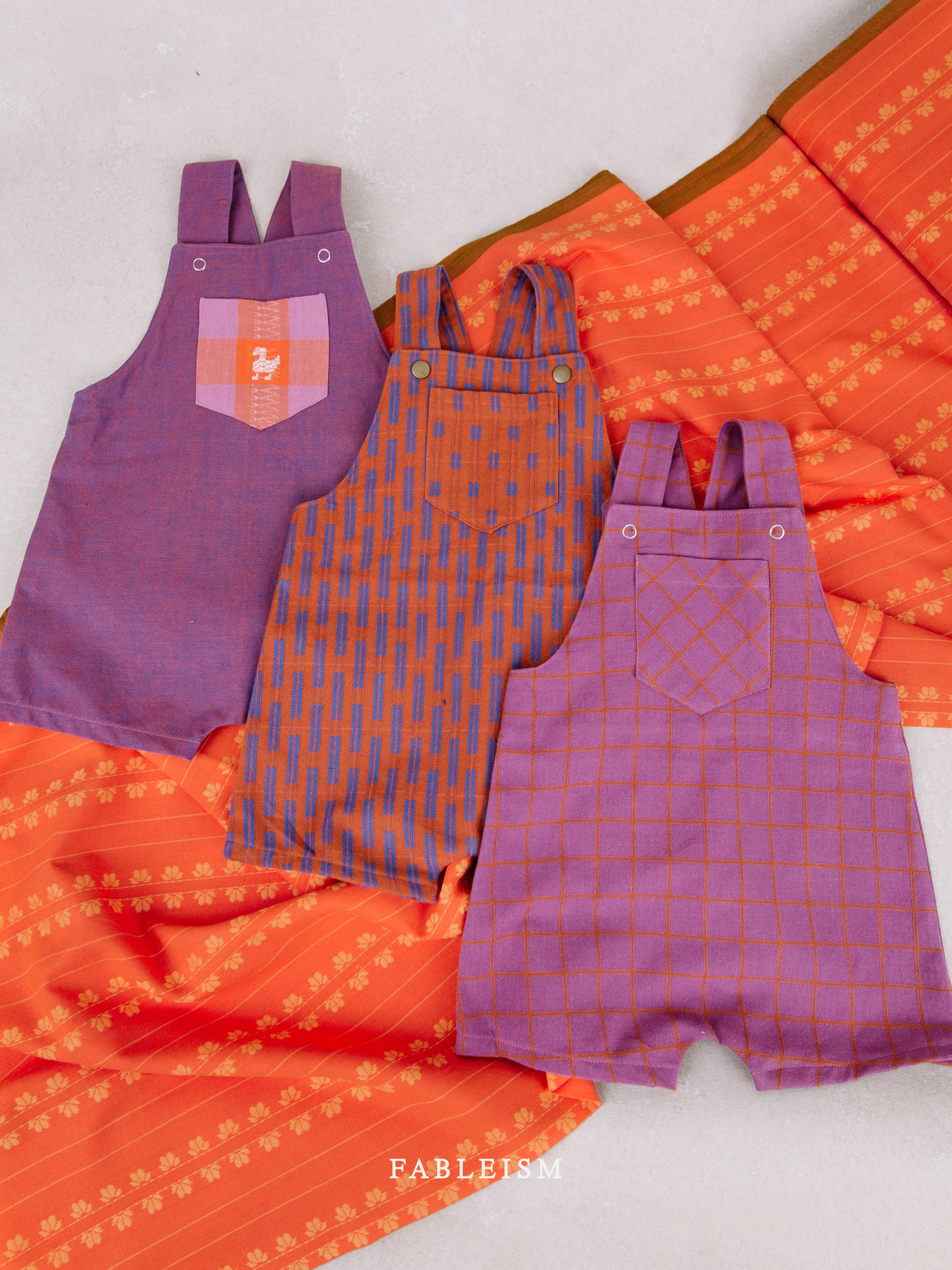 Warning: sewing tiny overalls may result in an overwhelming urge to make one in every color. 
-
Fine + Dandy shipping to shops soon. 
-
Pattern: Woven Overalls by @ohmeohmysewing.
Sewn by: @ai_and_me.